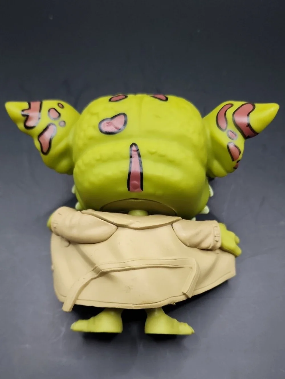 Funko Gremlin Figure with Silver Sunglasses and Tan Coat